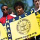 Members of the NAACP in front of the U.S. Supreme Court in Washington, D.C., on June 25, 2013
NICHOLAS KAMM/AFP/Getty Images